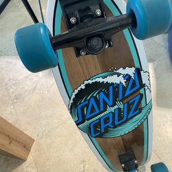 Santa Cruz Teal Skateboard