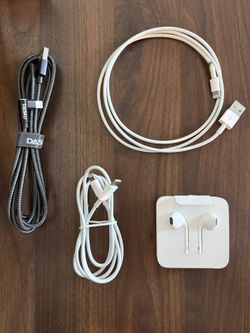 Apple Wired Ear Buds With Lightning Connector And Three Lightning Chargers
