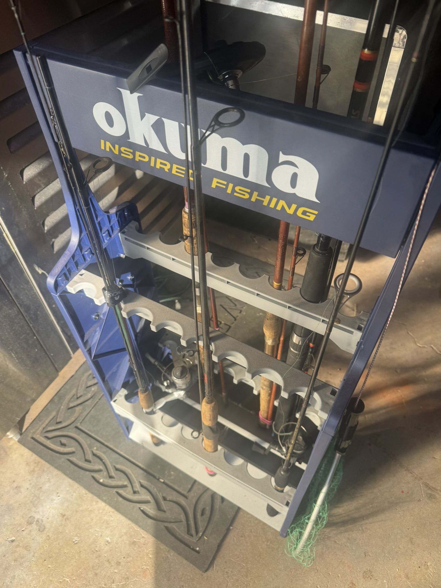 Fishing Rod Holder And Poles  OKUMA 
