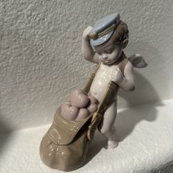 Lladro Love Letters Cupid figurine