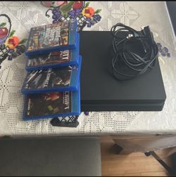 PS4 slim for sale along with 4 ps4 games. No controller  The four ps4 games are: - Call of duty: Black ops 3 - GTA V - Mortal Kombat X - Minecraft (ps