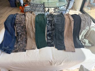 Long pants.  Waist is 30-31”; Length us 32”- 9 pairs