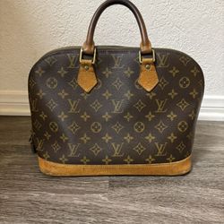 Louis Vuitton Alma Handbag 