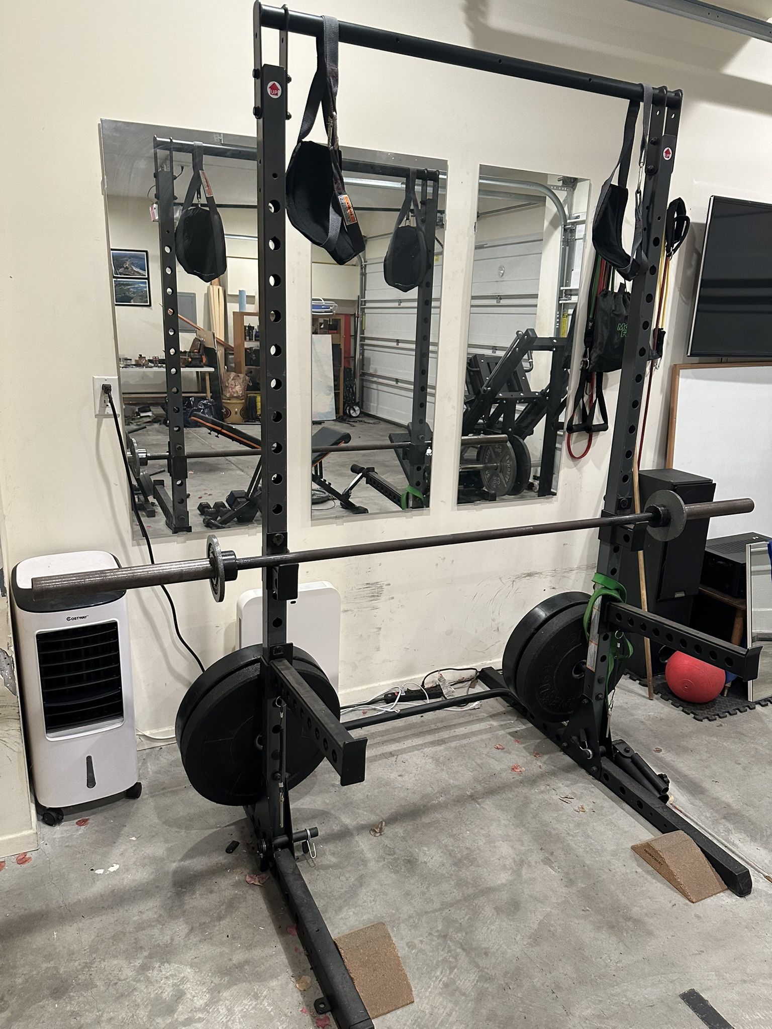 Squat rack / Bench press with barbell and weights