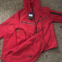 Red nike tech (small/medium)