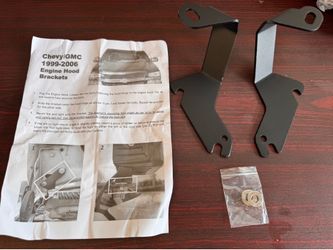 Under hood hinge ditch light mounting for chevy truck