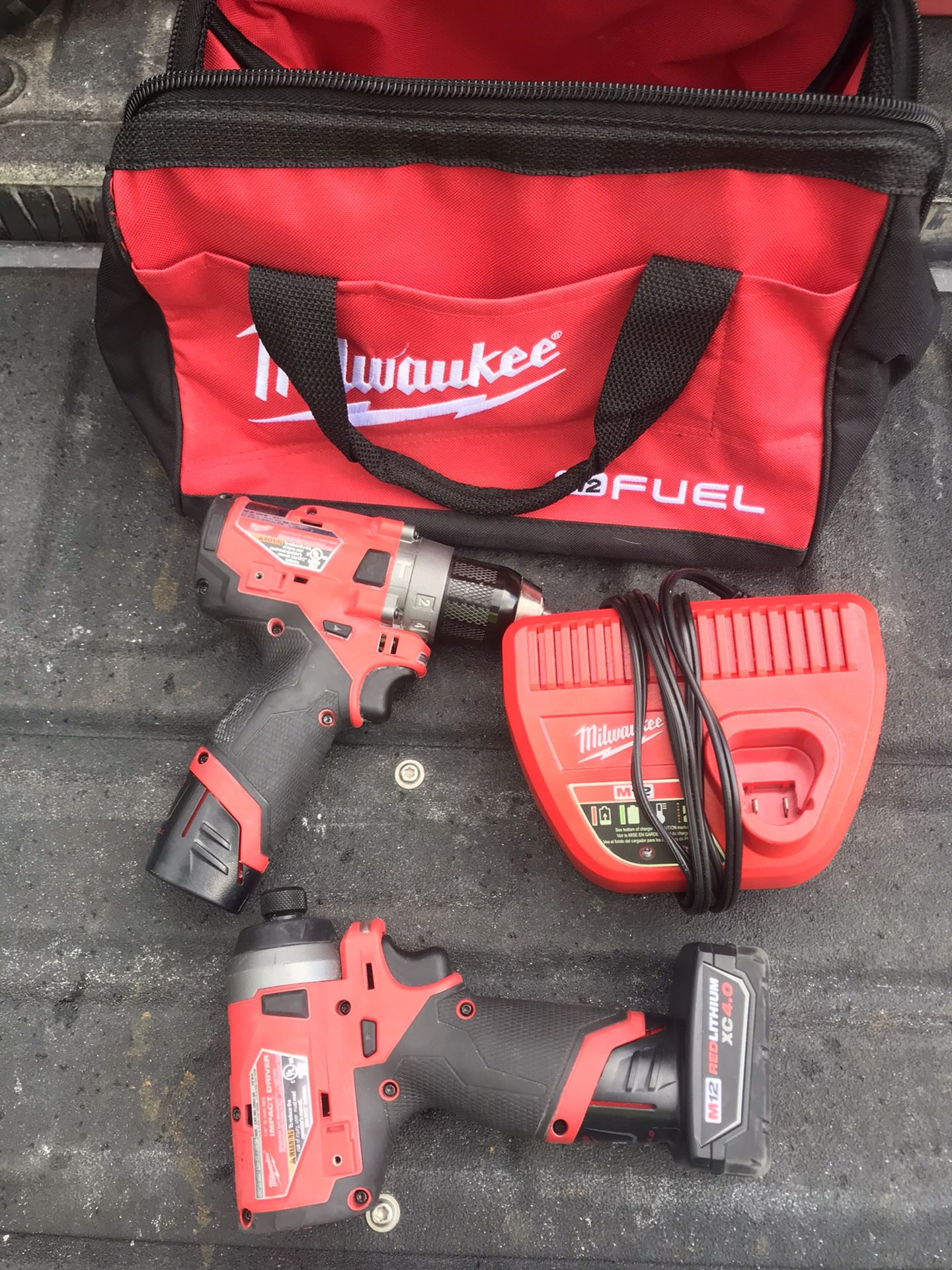 Milwaukee Fuel With Hammer Drill And Impact 2 Batteries Charger And Bag M12