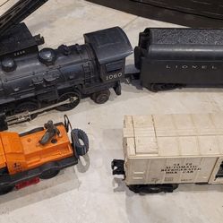 Assortment Of Older LIONEL TRAINS And Accessories 
