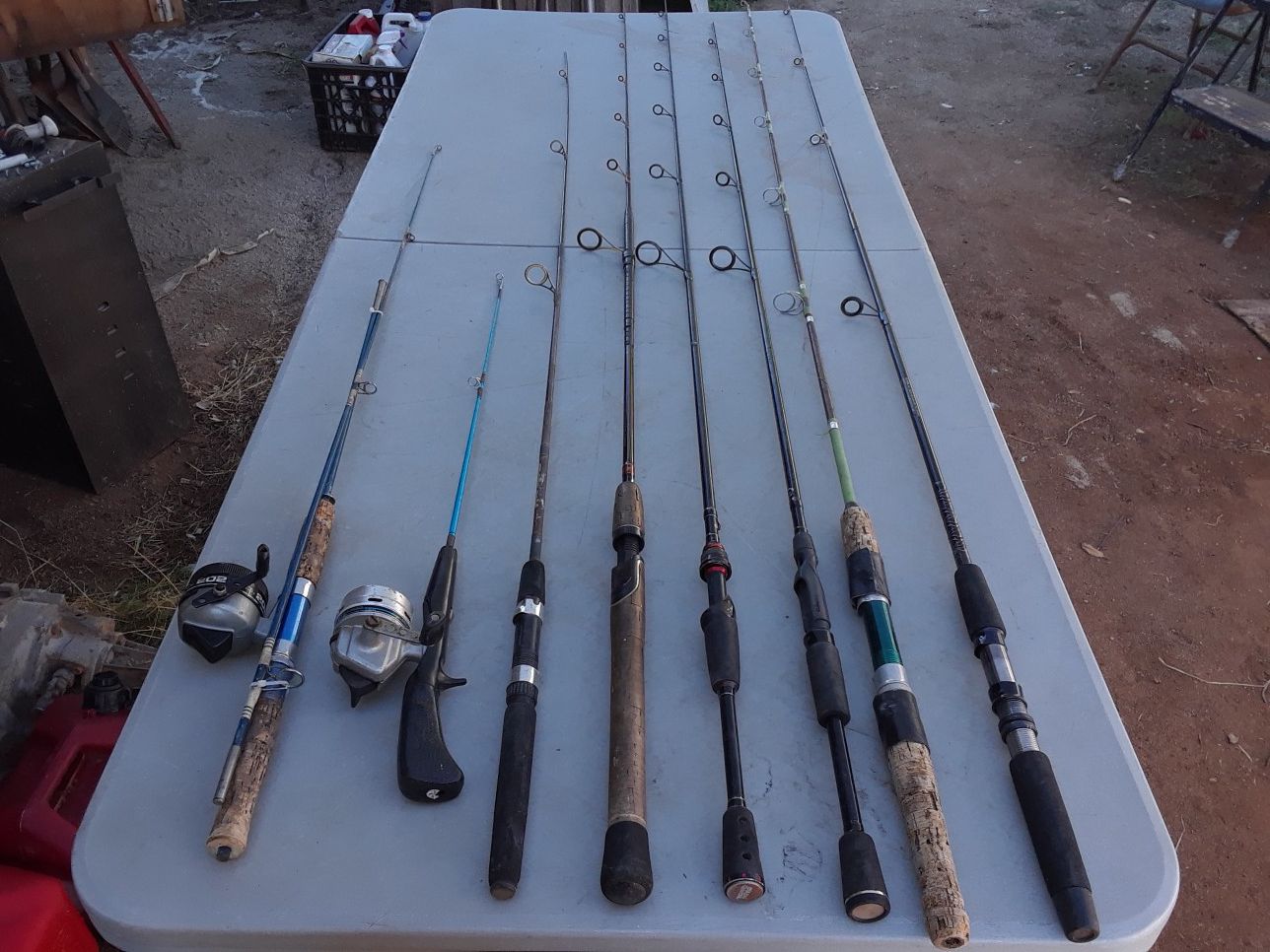 Assorted fishing poles for sale some with reels some have tip damage Garcia Shimano Daiwa $7 each