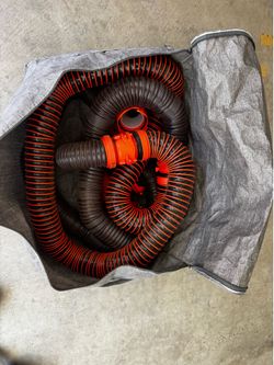 complete RV sewer hose kit with tote bag, multiple fittings, like new