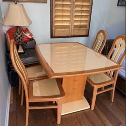 Beautiful dining table set with 4 matching chairs