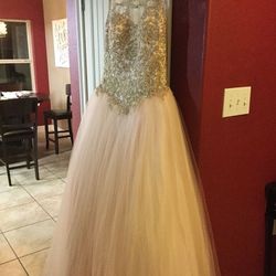 Quinceanera Dress: size 12 Blush Pink with Gold Top Only worn once for photos. Comes with petticoat and flower bouquet