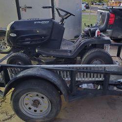 Riding Lawnmower And Trailer