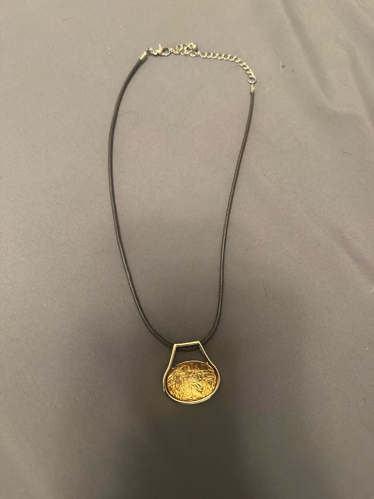 Necklace with gold pendant