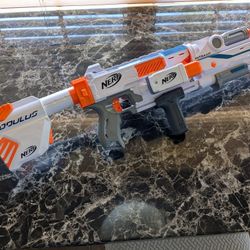 big NERF toy gun with multiple add-ons