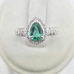 Platinum 0.90ct Si pear emerald & 0.41ctw diamond ring