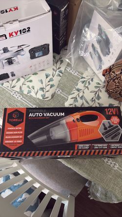 Portable auto vacuum with accessories