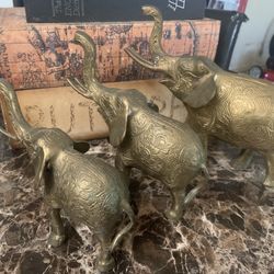 set of bronze elephants