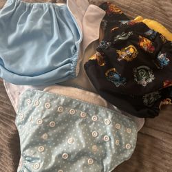 3 Brand New Reusable Diapers With 4 New Inserts