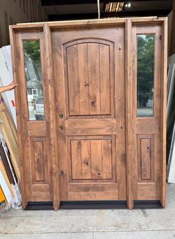 Krosswood Doors 64 in. x 80 in. Rustic Knotty Alder Arch Provincial Stained Wood Left Hand Single Prehung Front Door