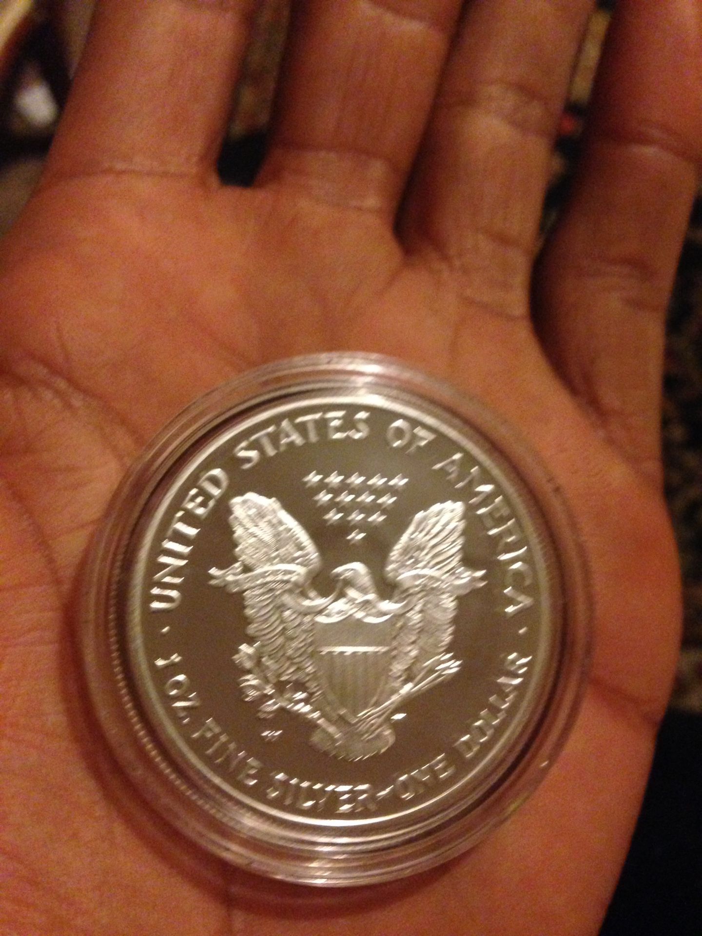 Silver fine dollar 1 oz.