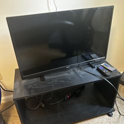 30 inch TV with rollable table
