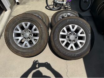 Toyota tacoma wheels and tires only 1500 miles on them like new will fit 2005 to 2023 or 4 runner  2003 to 2023