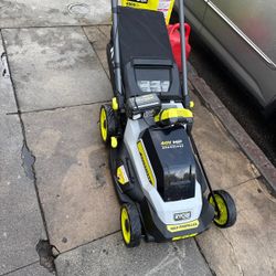Lawn Mower Ryobi Self Propelled costumer return to Home Depot As is $180