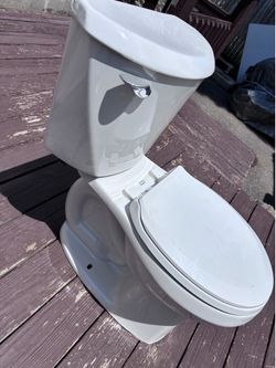 American Standard 16” high toilet
