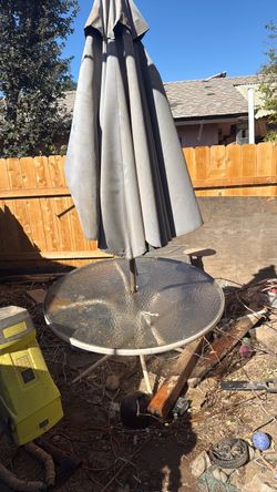 Glass table and umbrella