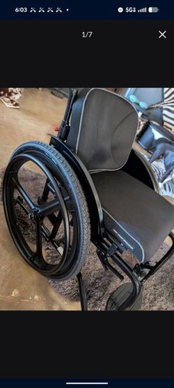 Wheelchair with one button quick release 24" wheel's