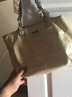 Coach purse has some marks but good purse