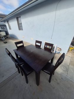 Dining table with 6 chairs.
