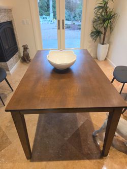 Table, stained dark, 35.25" x 60"