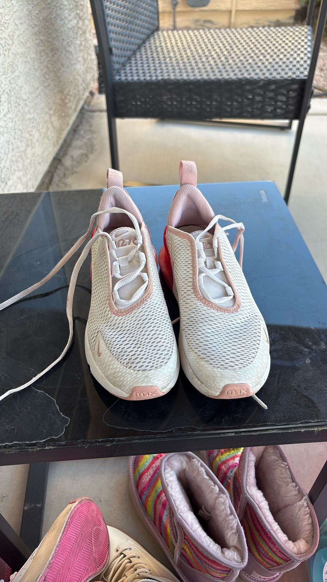 size 2 pink Nike air shoes