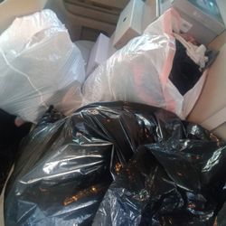 Bag Of Clothes And Women Shoes 