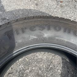 1 tire 235/65/18  Firestone