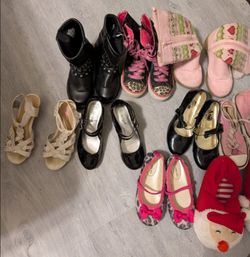 Like new 9 pairs of little girls shoes.