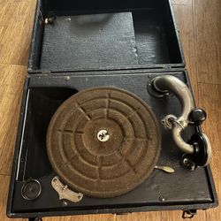 Vintage phonograph portable. Pricing is for item pictured. 