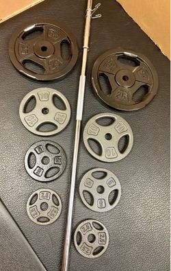 Standard Steel 6 ft Brand New Bar with pair of Cast Iron Plates of 25#, 10# , 5# and 2.5 pounders. Brute Weight: 105#