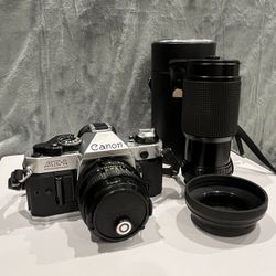 Canon AE-1 Program SLR Camera FD 50mm w/ Tou/Five Star 75-200mm  lens and Case 