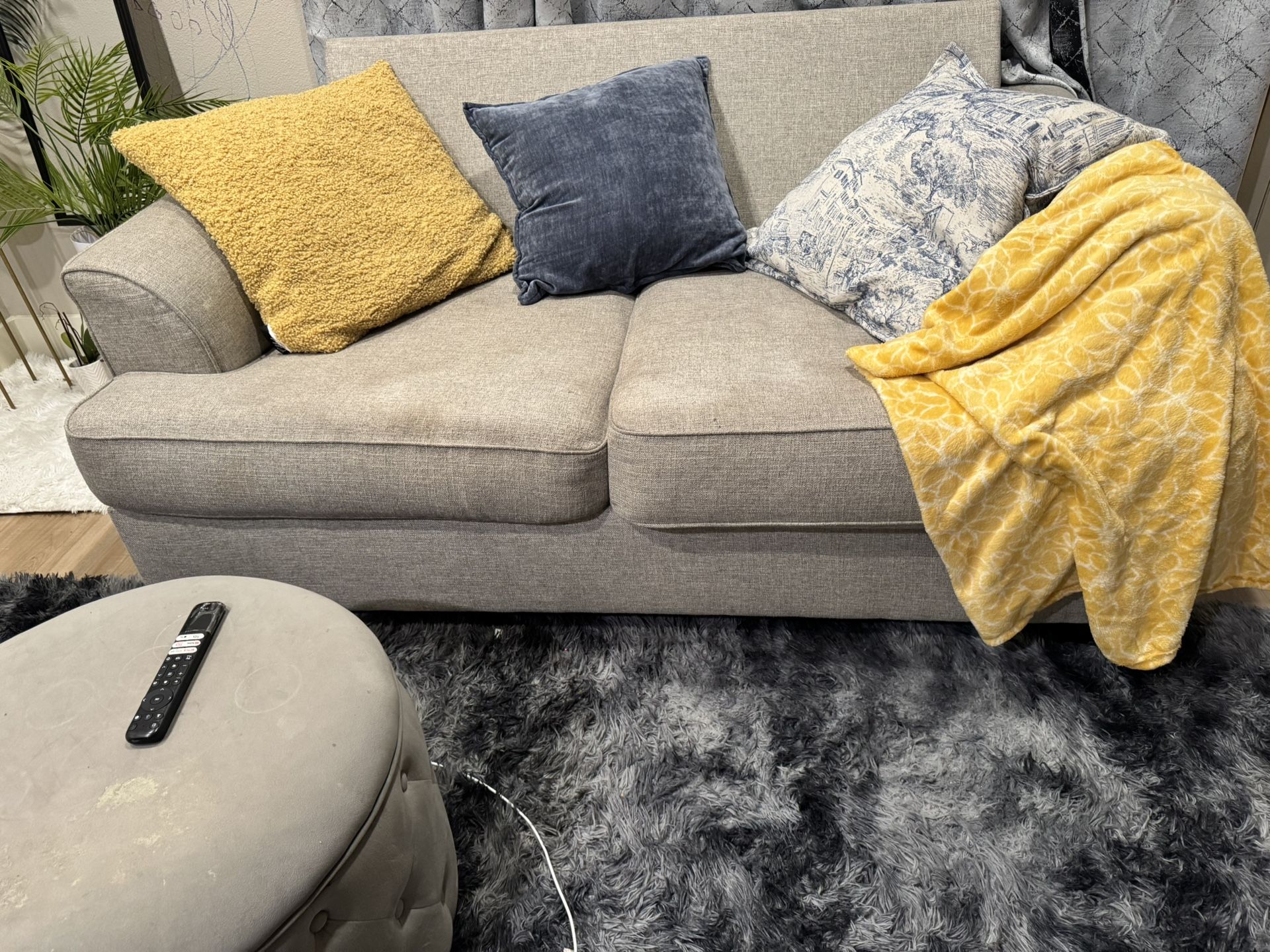 2 Couches , a 3 Seater, a 2 Seater and the ottoman