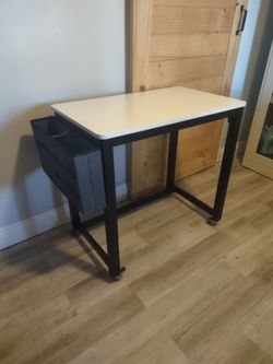 Brand new Ashley wood and metal desk.