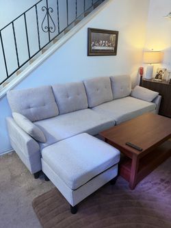 Light Gray L-Shaped Sectional Sofa with Ottoman – Very Good Condition