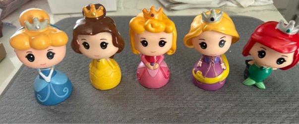 Disney Princesses as bath toys.