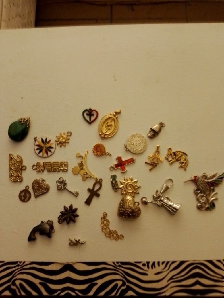 A Collection Of Assorted Pendants.