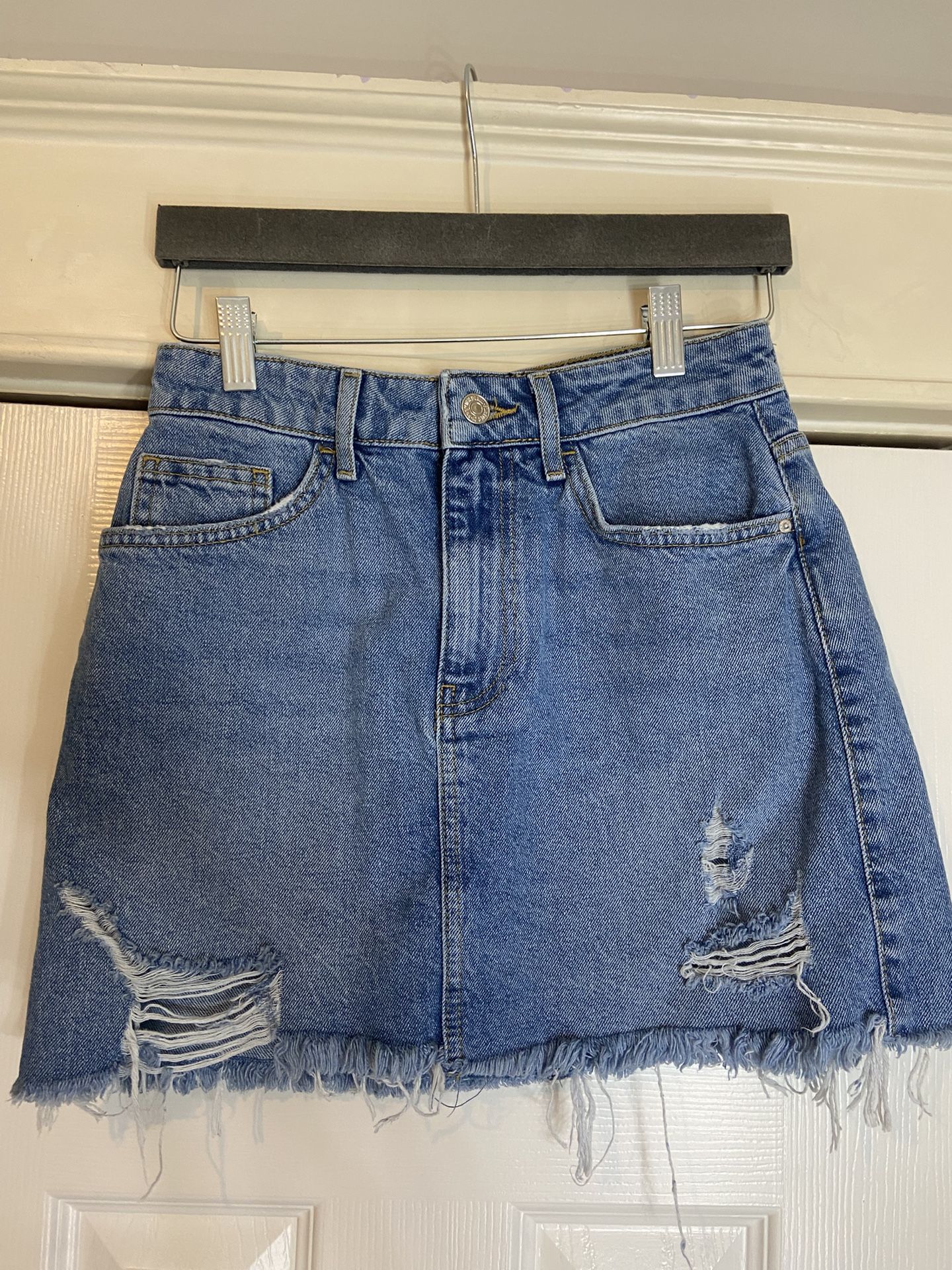 Woman’s short denim skirt