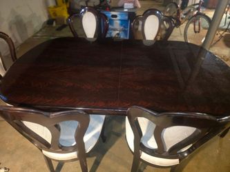 Formal dinning table with 6 chairs