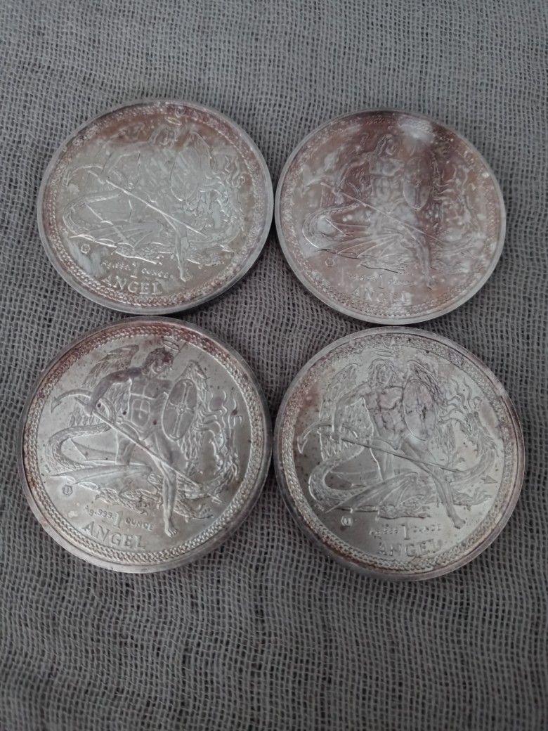 Four Round Silver Coins