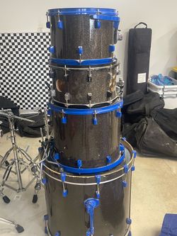 Drum set with stands, cymbals, and bags